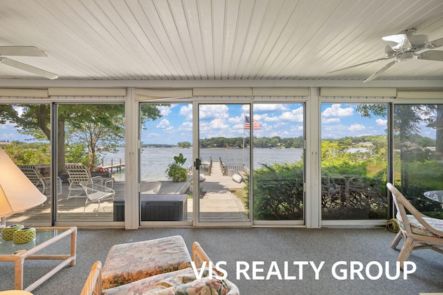 537 Buena Vista Dr, Spring Lake, MI 49456 - sunroom featuring ceiling fan, a water view, and plenty of natural light