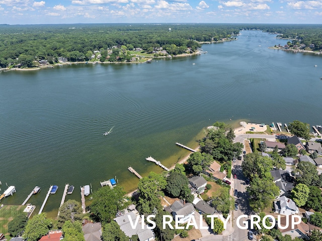 537 Buena Vista Dr, Spring Lake, MI 49456 - drone / aerial view of a large body of water and a heavily wooded area