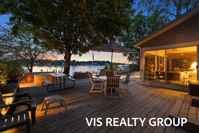 537 Buena Vista Dr, Spring Lake, MI 49456 - wooden terrace with a hot tub, a water view, and a sunroom