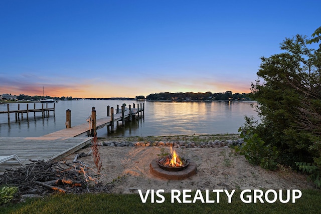 537 Buena Vista Dr, Spring Lake, MI 49456 - dock featuring an outdoor fire pit and a water view