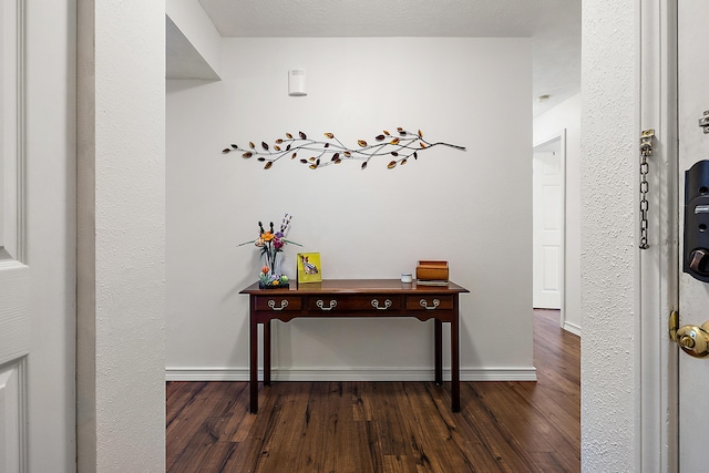 1734 Weatherstone Dr, Ann Arbor, MI 48108 - hallway with dark wood finished floors and baseboards