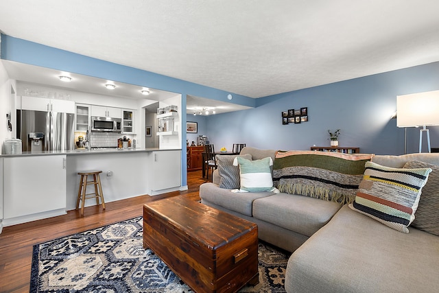 1734 Weatherstone Dr, Ann Arbor, MI 48108 - living room featuring dark wood finished floors