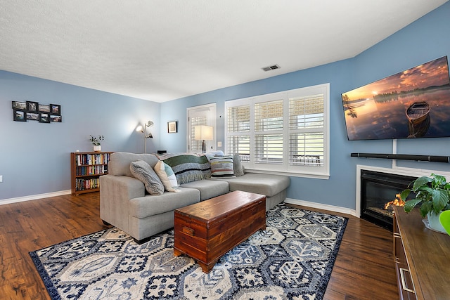 1734 Weatherstone Dr, Ann Arbor, MI 48108 - living room with wood finished floors and a glass covered fireplace