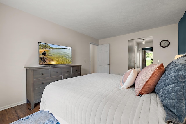 1734 Weatherstone Dr, Ann Arbor, MI 48108 - bedroom featuring wood finished floors and baseboards
