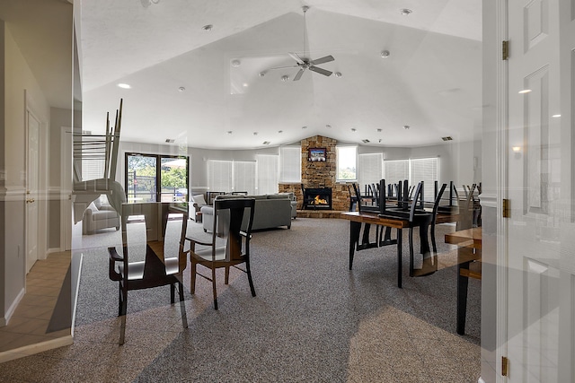 1734 Weatherstone Dr, Ann Arbor, MI 48108 - dining area featuring a ceiling fan, vaulted ceiling, a fireplace, and recessed lighting