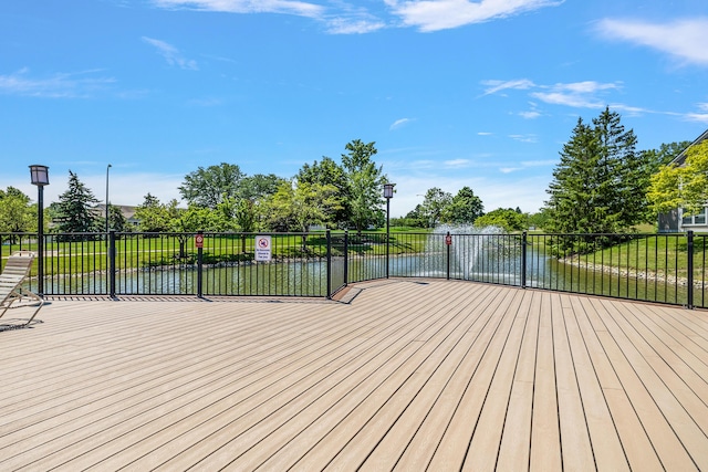 1734 Weatherstone Dr, Ann Arbor, MI 48108 - deck with a water view and a yard