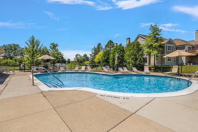 1734 Weatherstone Dr, Ann Arbor, MI 48108 - community pool featuring a patio