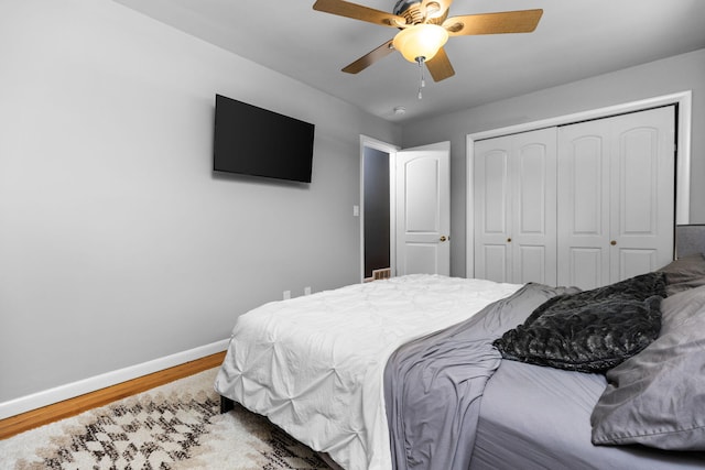 1534 Barrington Pl, Ann Arbor, MI 48103 - bedroom with wood finished floors, a closet, and ceiling fan