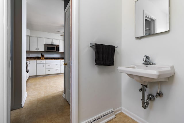 1534 Barrington Pl, Ann Arbor, MI 48103 - bathroom with baseboards and tile patterned floors