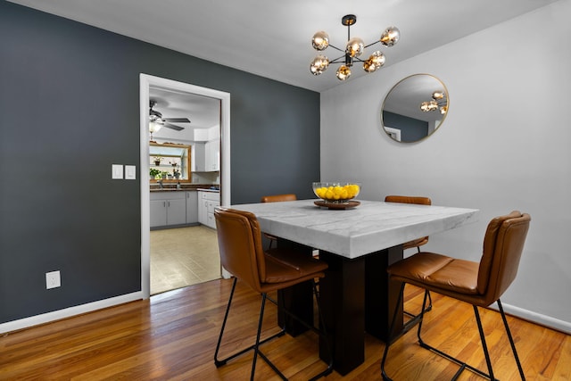1534 Barrington Pl, Ann Arbor, MI 48103 - dining area featuring a chandelier and wood finished floors
