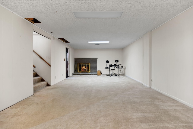 1534 Barrington Pl, Ann Arbor, MI 48103 - basement with a brick fireplace, carpet flooring, and stairway