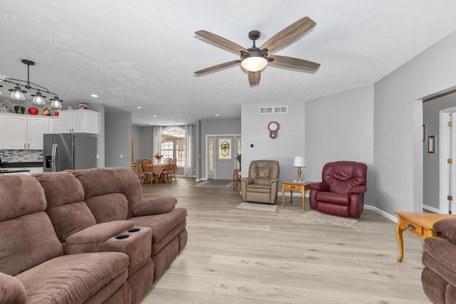 23103 13 Mile Rd, Big Rapids, MI 49307 - living area featuring ceiling fan, light wood-type flooring, and recessed lighting