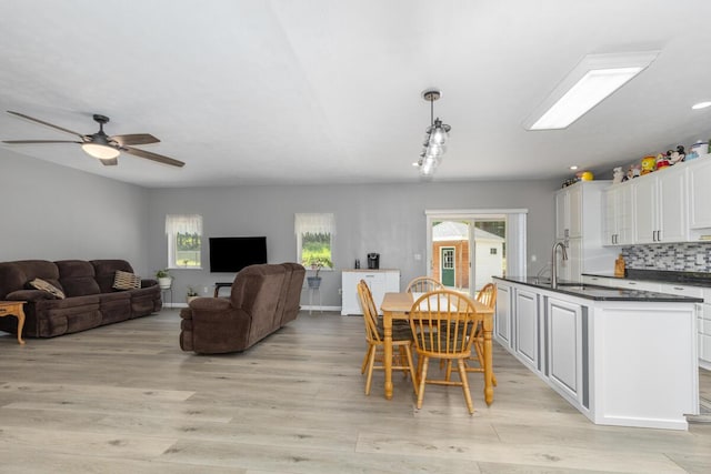 23103 13 Mile Rd, Big Rapids, MI 49307 - dining space with light wood-style flooring and ceiling fan