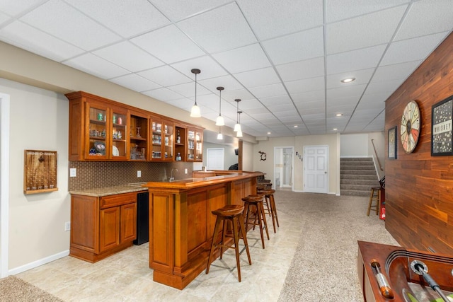 23103 13 Mile Rd, Big Rapids, MI 49307 - indoor bar featuring stairs, decorative light fixtures, recessed lighting, a paneled ceiling, and backsplash