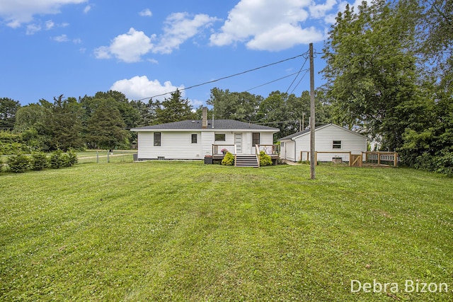 17929 S River Rd, Three Rivers, MI 49093 - back of house with a deck and a chimney