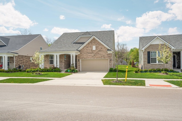4814 Cranston Rd Unit 86, Canton, MI 48188 - craftsman-style home with concrete driveway, a front lawn, stone siding, and a shingled roof