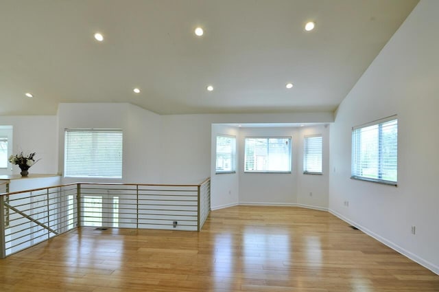 2019 Chalmers Dr, Ann Arbor, MI 48104 - empty room with wood finished floors and recessed lighting