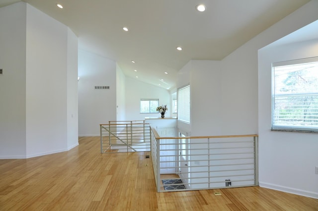 2019 Chalmers Dr, Ann Arbor, MI 48104 - corridor featuring an upstairs landing, wood finished floors, recessed lighting, and lofted ceiling