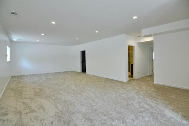 2019 Chalmers Dr, Ann Arbor, MI 48104 - spare room featuring light colored carpet and recessed lighting