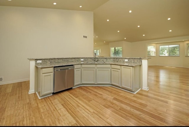 2019 Chalmers Dr, Ann Arbor, MI 48104 - kitchen with dishwasher, open floor plan, light wood-type flooring, light stone counters, and recessed lighting