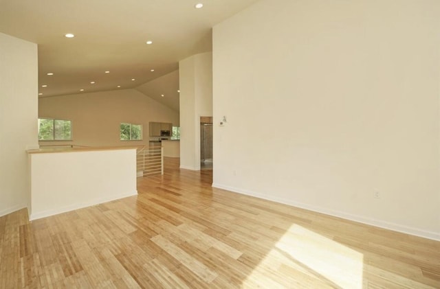 2019 Chalmers Dr, Ann Arbor, MI 48104 - unfurnished room featuring recessed lighting, light wood-style floors, and lofted ceiling