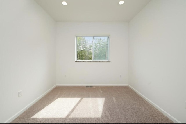 2019 Chalmers Dr, Ann Arbor, MI 48104 - empty room featuring recessed lighting and light carpet