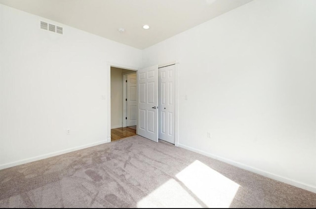 2019 Chalmers Dr, Ann Arbor, MI 48104 - carpeted spare room featuring baseboards and recessed lighting