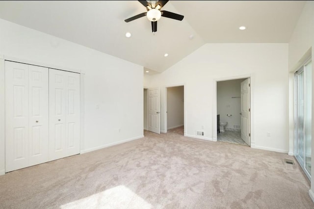 2019 Chalmers Dr, Ann Arbor, MI 48104 - unfurnished bedroom with lofted ceiling, light carpet, connected bathroom, recessed lighting, and a closet