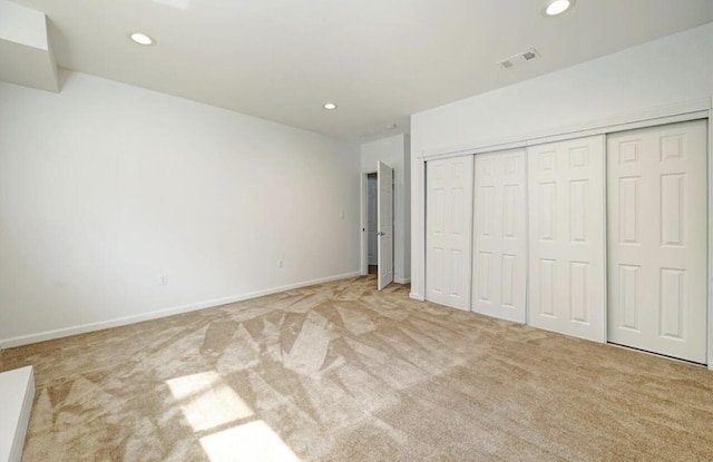 2019 Chalmers Dr, Ann Arbor, MI 48104 - unfurnished bedroom with carpet flooring, recessed lighting, and a closet