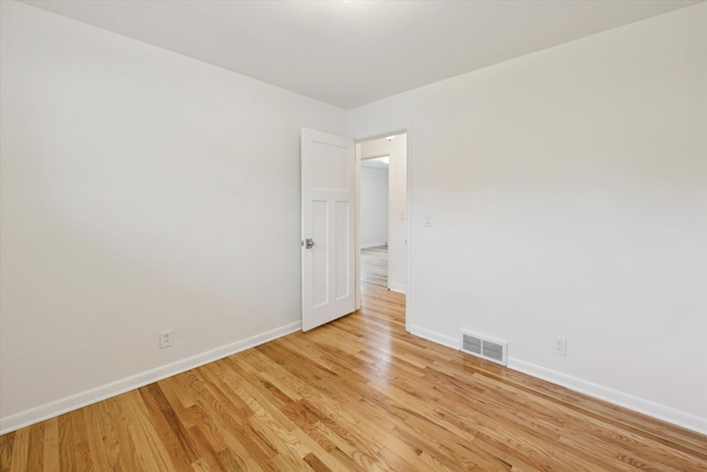 2010 Brampton Ct, Ann Arbor, MI 48103 - spare room featuring light wood-style flooring and baseboards