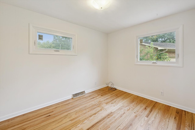 2010 Brampton Ct, Ann Arbor, MI 48103 - spare room with healthy amount of natural light and light wood-style flooring