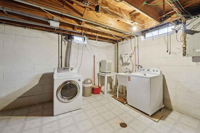 2010 Brampton Ct, Ann Arbor, MI 48103 - laundry room with tile patterned floors and washer and clothes dryer