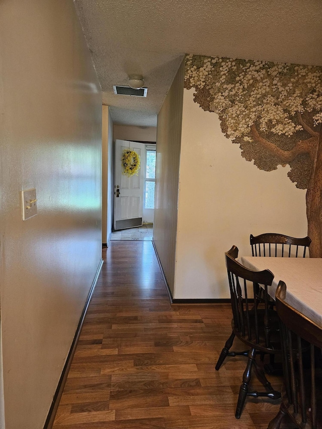 4810 Grandview Dr, Ypsilanti, MI 48197 - corridor featuring a textured ceiling and wood finished floors