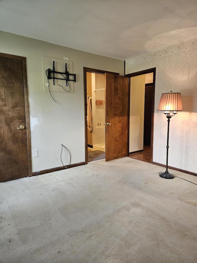 4810 Grandview Dr, Ypsilanti, MI 48197 - unfurnished bedroom featuring carpet flooring and connected bathroom