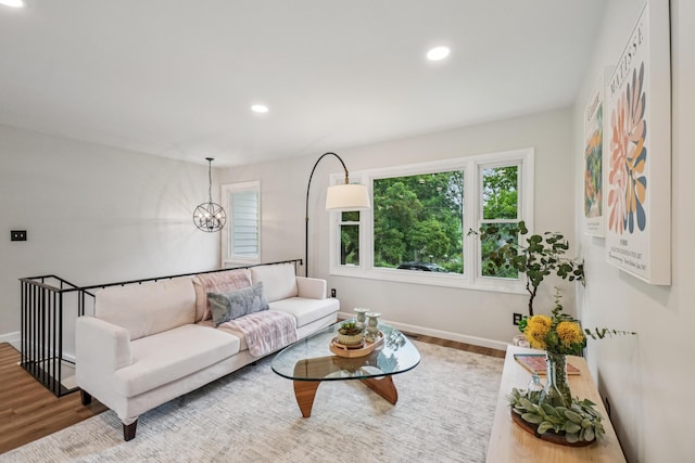 3110 Hilltop Dr, Ann Arbor, MI 48103 - living area featuring wood finished floors, recessed lighting, and a chandelier