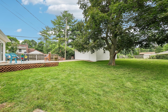 3110 Hilltop Dr, Ann Arbor, MI 48103 - view of yard with a wooden deck and an outbuilding