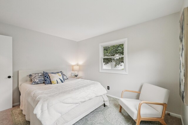 3110 Hilltop Dr, Ann Arbor, MI 48103 - bedroom featuring carpet floors and baseboards