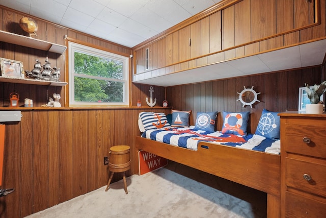 3110 Hilltop Dr, Ann Arbor, MI 48103 - carpeted bedroom with wooden walls