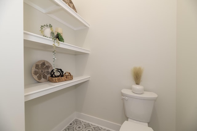 1717 Toscana St, Kalamazoo, MI 49009 - bathroom featuring toilet and tile patterned floors