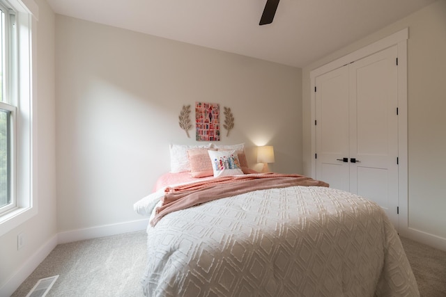 1717 Toscana St, Kalamazoo, MI 49009 - carpeted bedroom featuring a closet and a ceiling fan