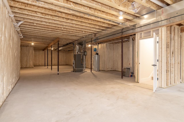1717 Toscana St, Kalamazoo, MI 49009 - unfinished basement with water heater and heating unit