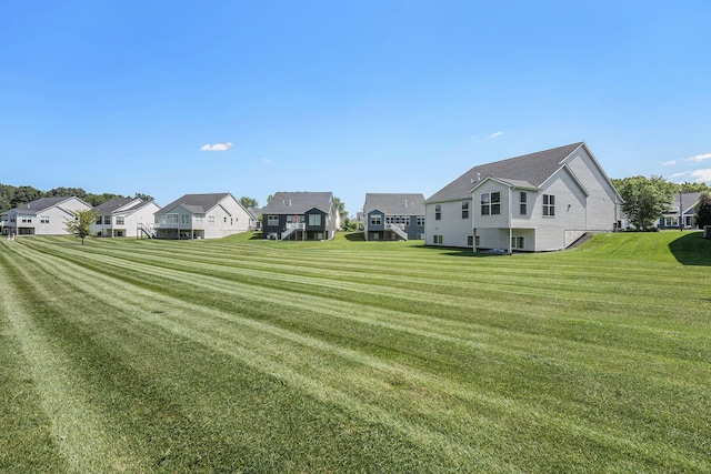 8275 Woodhaven Dr SW, Byron Center, MI 49315 - view of grassy yard featuring a residential view