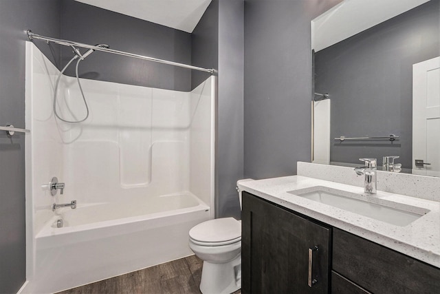8275 Woodhaven Dr SW, Byron Center, MI 49315 - full bathroom with wood finished floors, bathtub / shower combination, and vanity