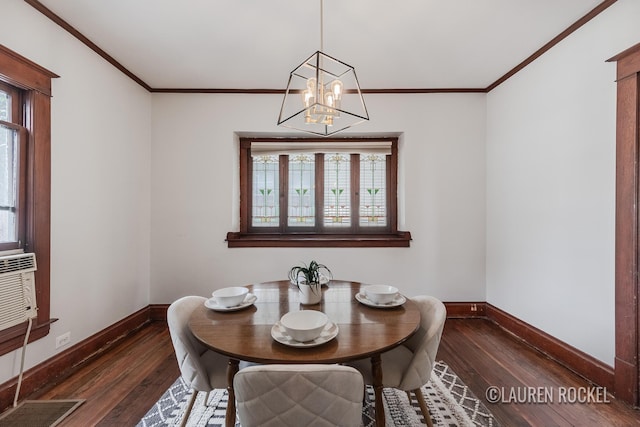 129 Dean St NE, Grand Rapids, MI 49505 - dining area featuring wood-type flooring, ornamental molding, and a chandelier