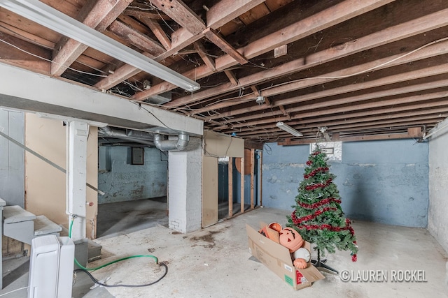 129 Dean St NE, Grand Rapids, MI 49505 - below grade area featuring stairs and electric panel