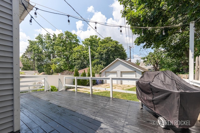 129 Dean St NE, Grand Rapids, MI 49505 - wooden terrace with a garage, an outdoor structure, and area for grilling