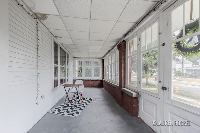 129 Dean St NE, Grand Rapids, MI 49505 - sunroom / solarium featuring french doors and plenty of natural light