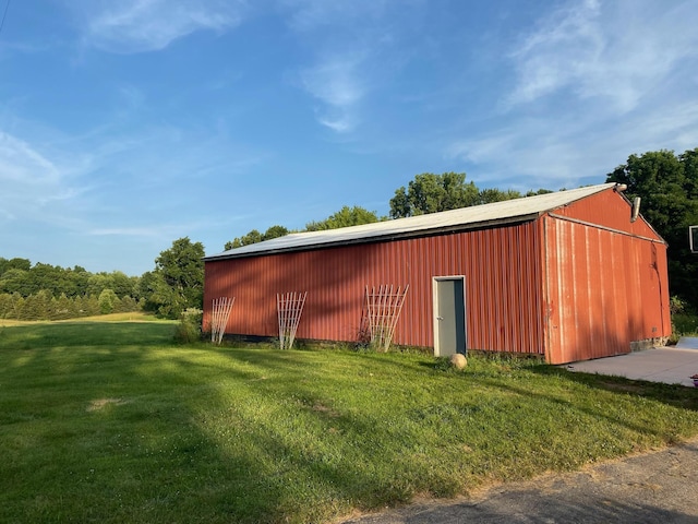 15775 Cassidy Rd, Chelsea, MI 48118 - view of pole building featuring a yard
