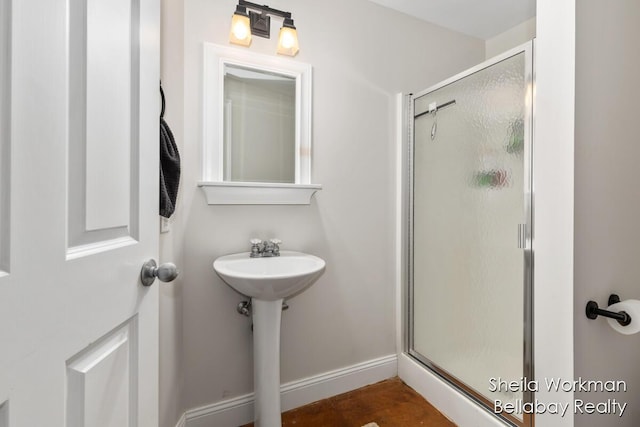 1932 Buehler Rd, Hastings, MI 49058 - full bathroom with a shower stall and baseboards