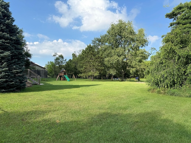 1932 Buehler Rd, Hastings, MI 49058 - view of grassy yard featuring a playground